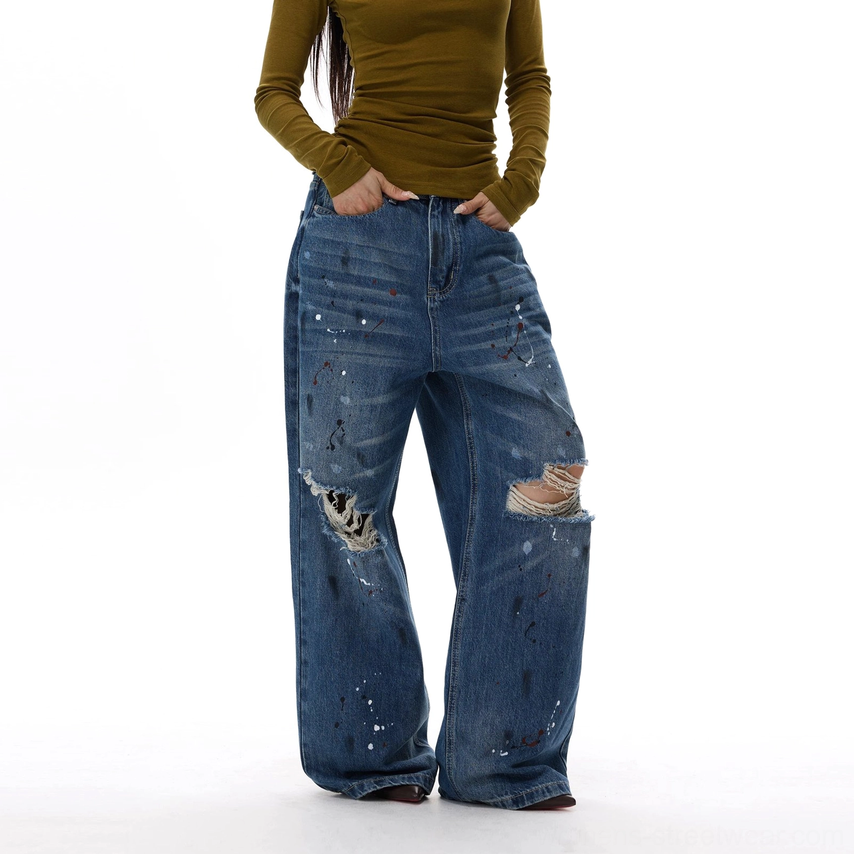 Blue paint splatter distressed wide-leg jeans with vintage fading, frayed knees, and relaxed Y2K streetwear fit