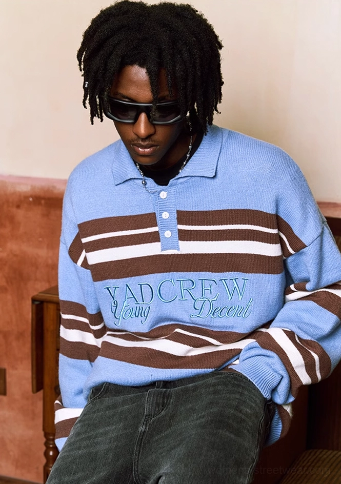 Blue striped embroidered polo sweater oversized streetwear fit styled with dark wash denim