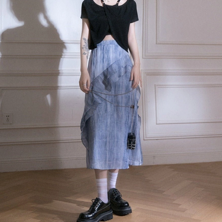 Blue tie-dye ruffle cascade streetwear maxi skirt fashion product detail view highlighting its flowing layered silhouette