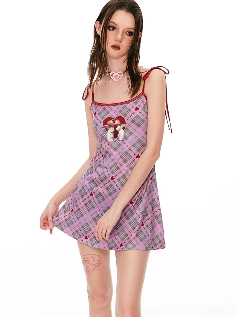 Blue and white checked mini dress with red tie shoulder straps and dreamy angel graphic detail