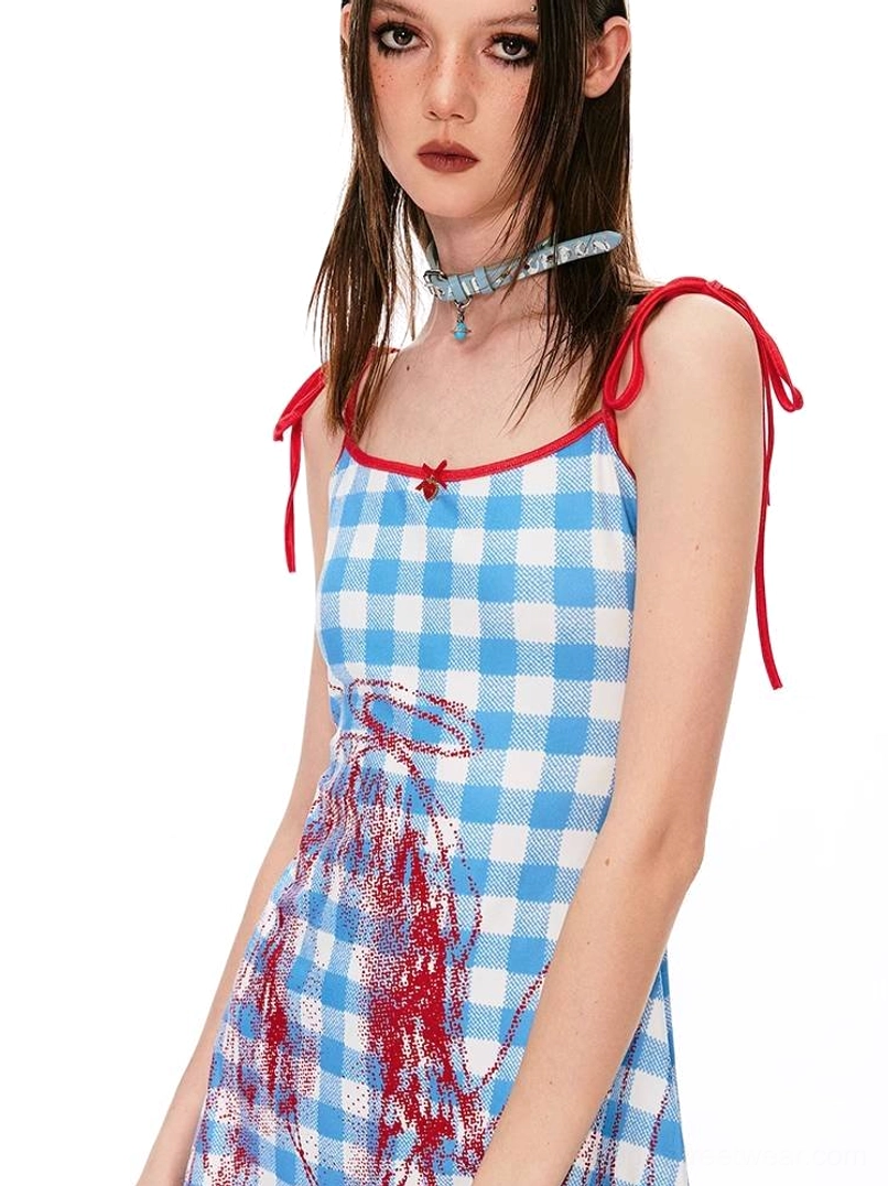 Blue and white gingham mini dress with red spaghetti straps, angel wing print, and contrast neckline detail