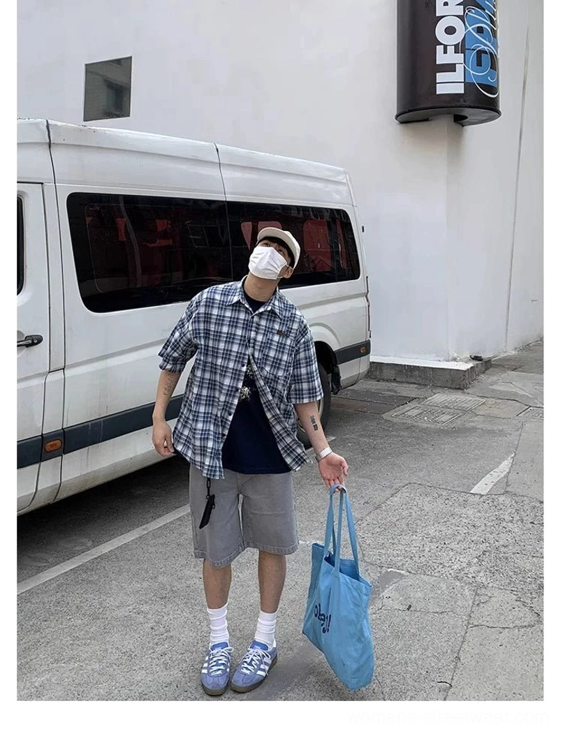 Blue and white plaid oversized short sleeve button-up shirt product image for Korean streetwear, relaxed summer styling, and casual layered outfits