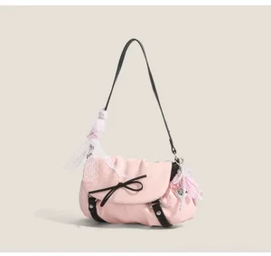 Pink ruched Y2K flap shoulder bag side three quarter view with black strap gingham ribbon charm and front bow