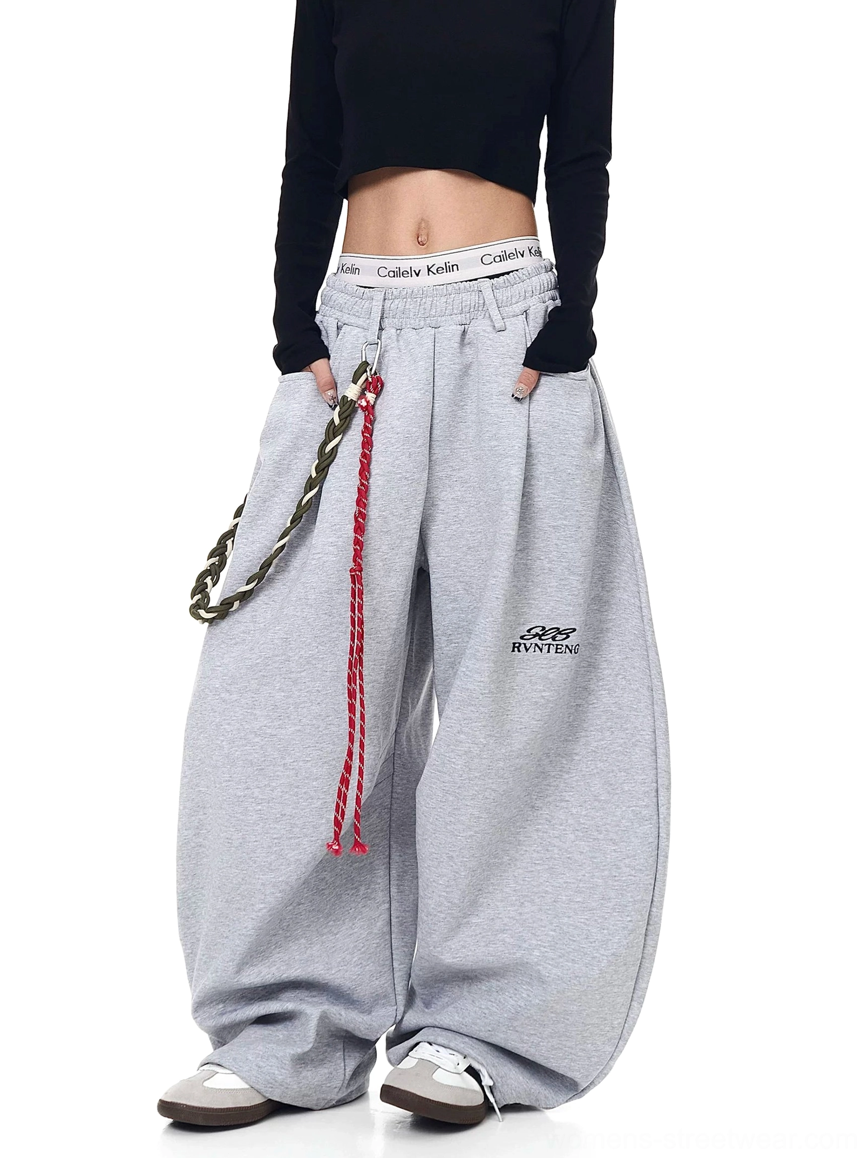 Gray fleece wide-leg track pants with oversized streetwear fit braided rope keychain and embroidered thigh detail