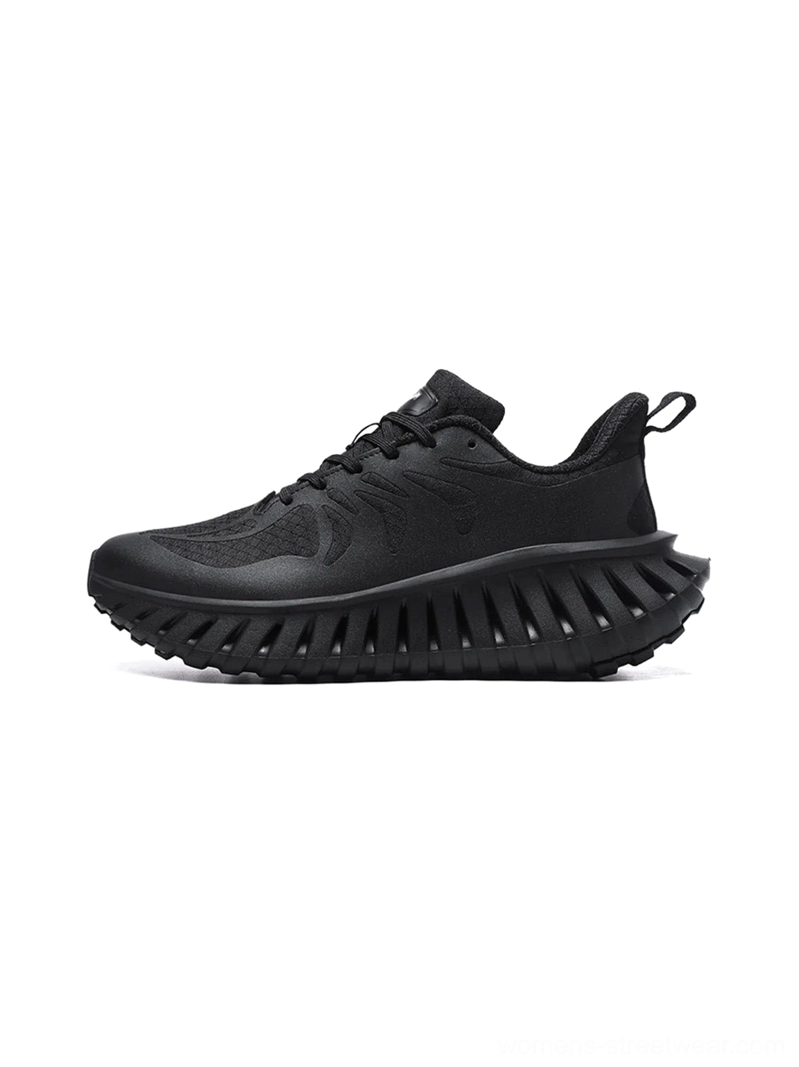 Black breathable running sneakers shown from the side with a lace-up mesh upper, rear pull tab, layered panels, and thick serrated streetwear outsole
