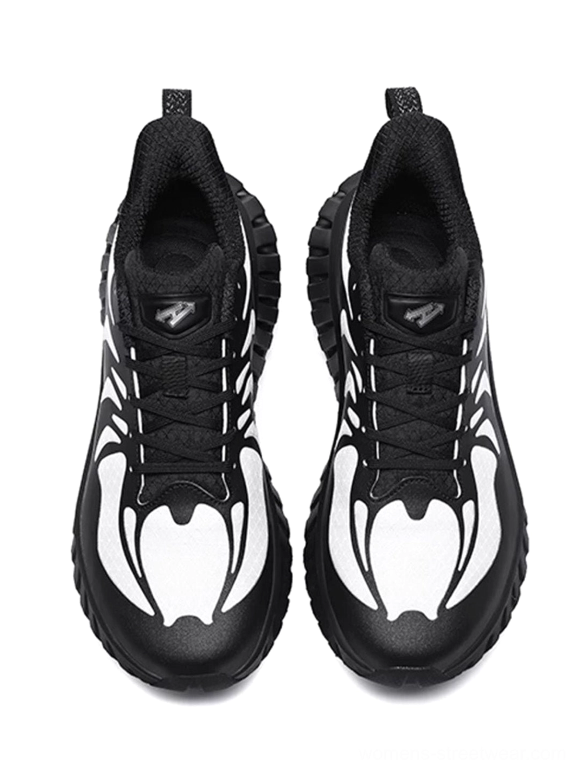 Breathable colorblock skeletal running sneakers featuring a layered athletic upper, lace-up closure, cushioned profile, and serrated outsole