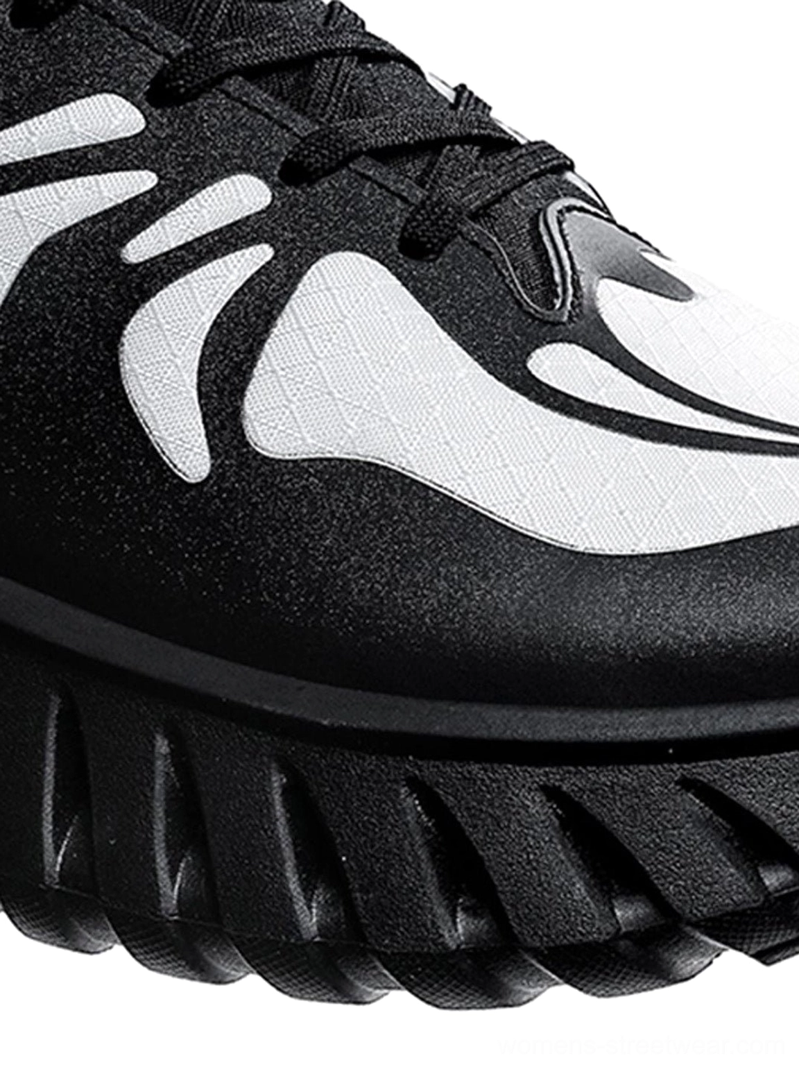 Modern low-top colorblock running sneakers designed with a mesh-style upper, adjustable laces, rear pull tab, and thick textured outsole