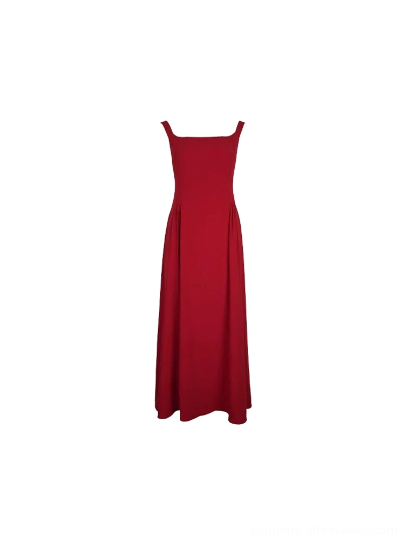 Flat lay display of a bright red retro sleeveless maxi dress showing the square neckline, structured waist, and smooth A line skirt