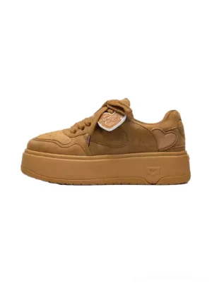 Brown Angel heart platform skate sneakers for women shown from the left side with a suede-look artificial leather upper, raised sole, and heart heel detail
