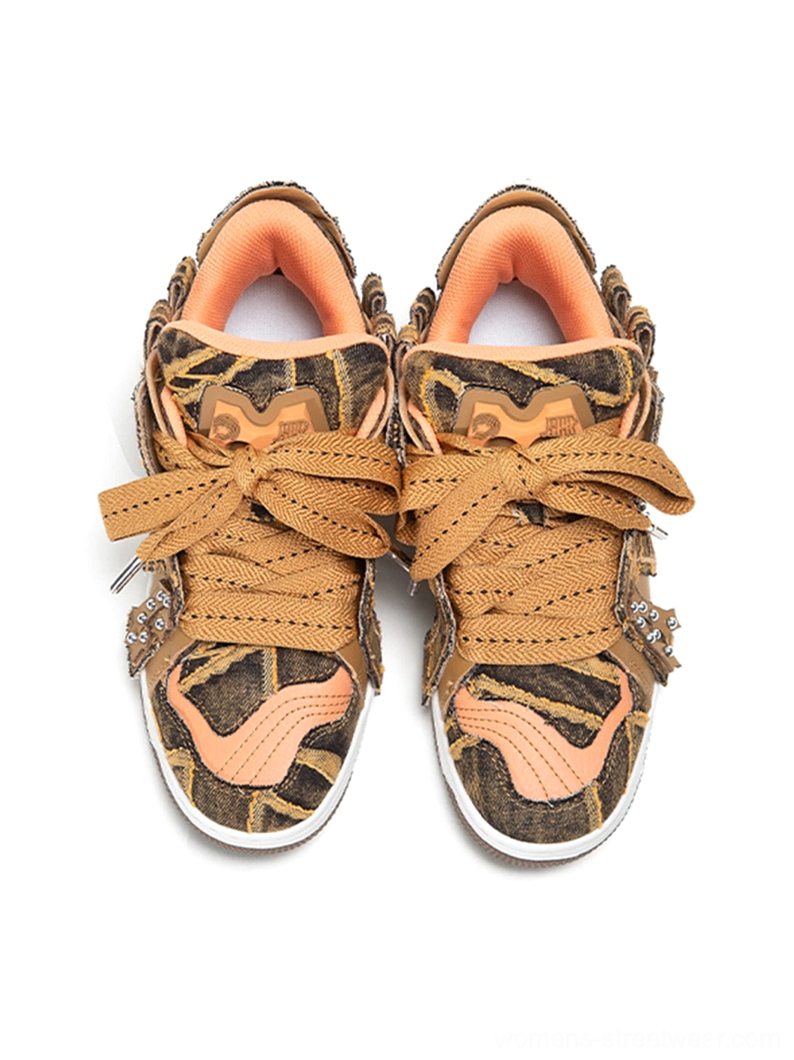 Top front view of brown camo chunky platform skate sneakers with orange toe accents and layered straps