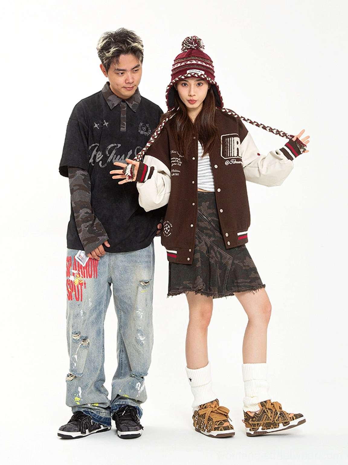Couple streetwear outfit featuring female model in brown camo chunky platform skate sneakers