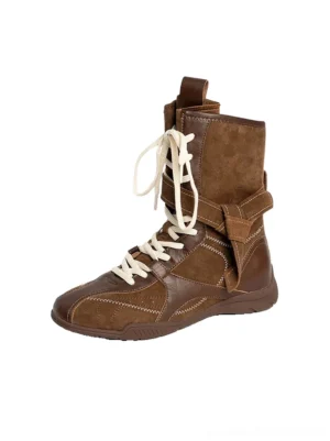 Brown contrast stitch leather mid-calf lace-up streetwear boot side view with suede panels, wraparound strap, zipper and pull tab