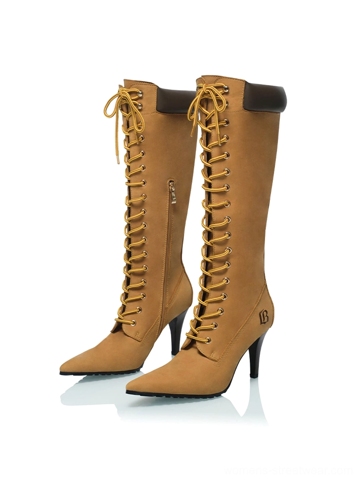 Pair of brown corset lace pointed toe knee-high stiletto boots displaying front lacing and slim heels