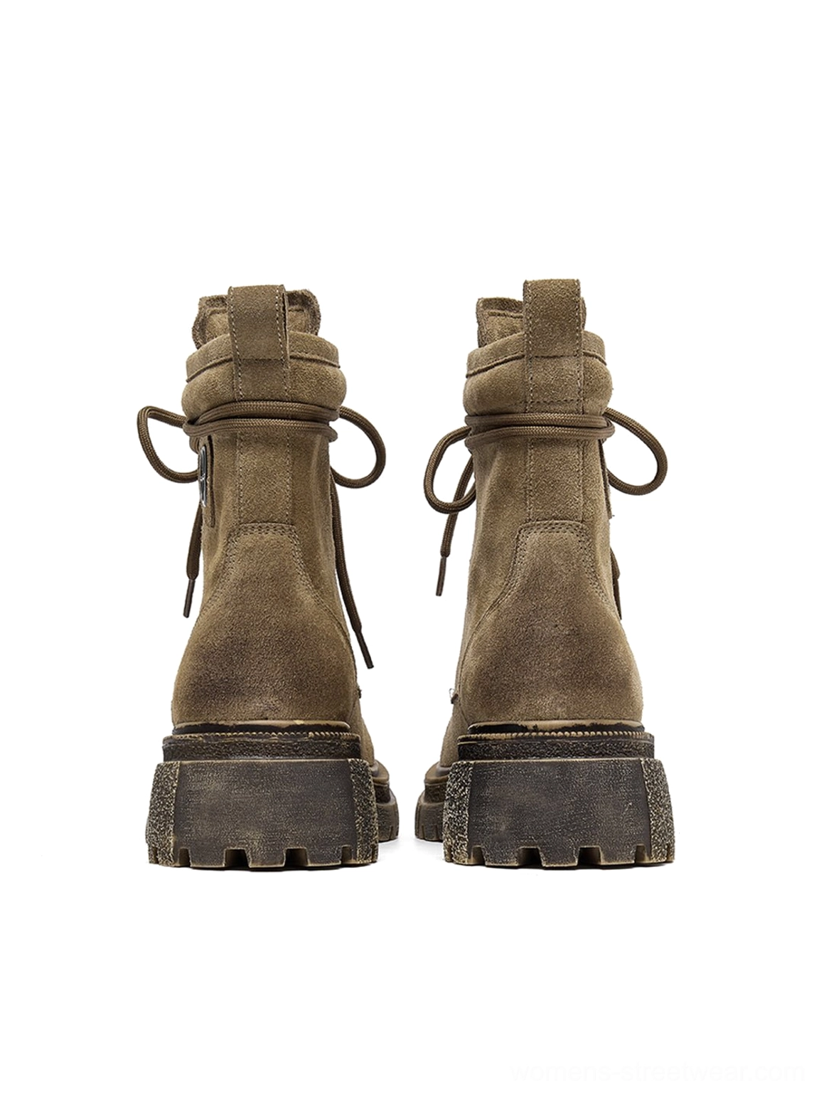 Distressed platform combat boots brown color close-up detail shot showing suede texture fabric weathering lug sole grip pattern