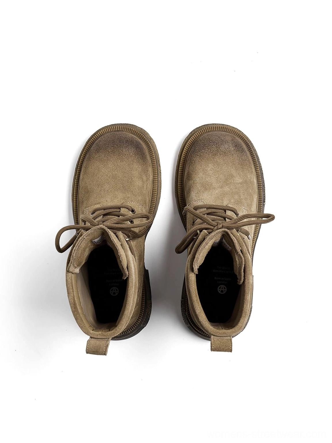 Overhead top view brown distressed combat boots pair on white background showing insole toe cap brand logo worn distressed finish