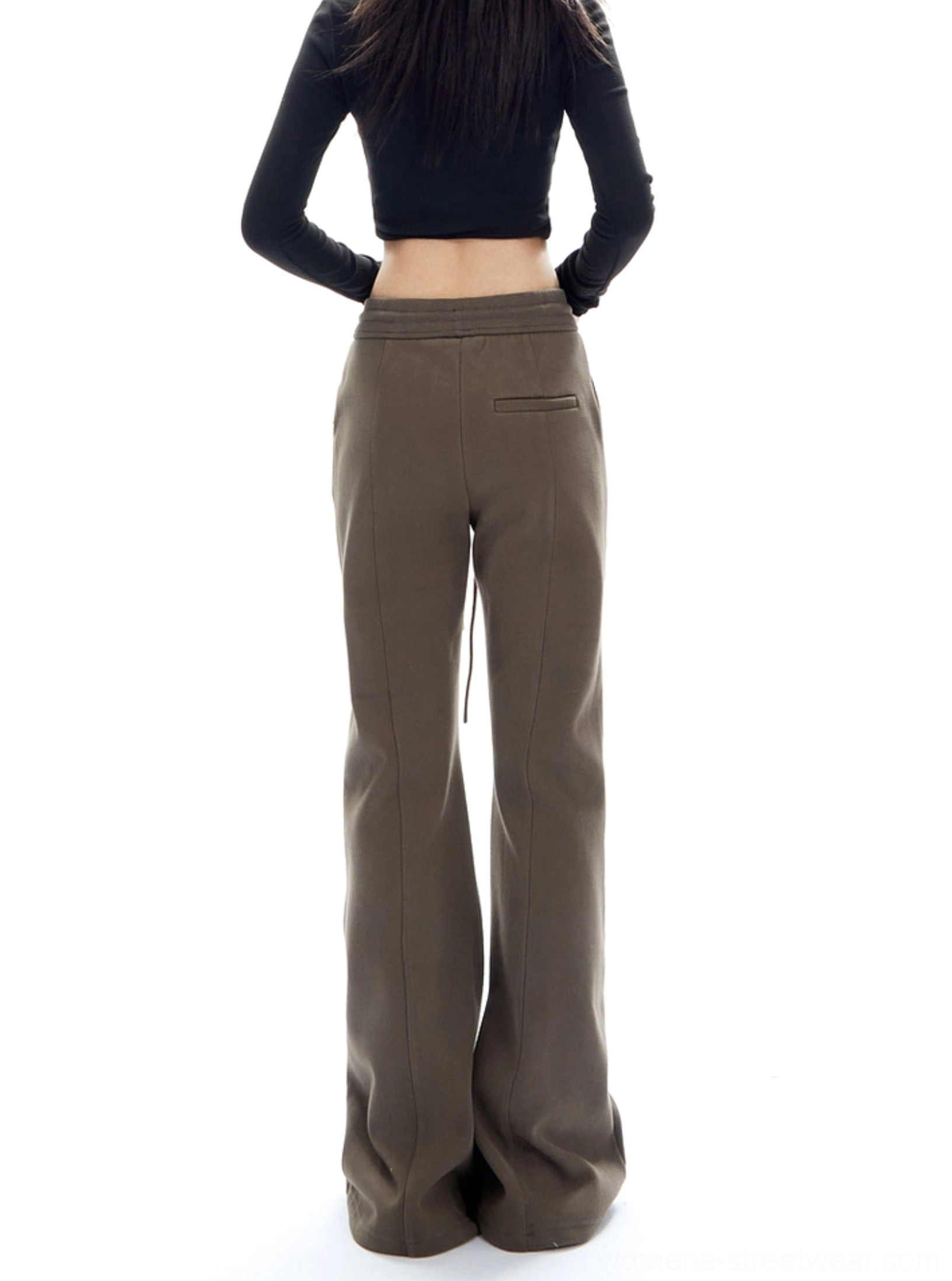 Back view of brown flared lounge pants showing high-waisted fit, rear seam, and back pocket detail