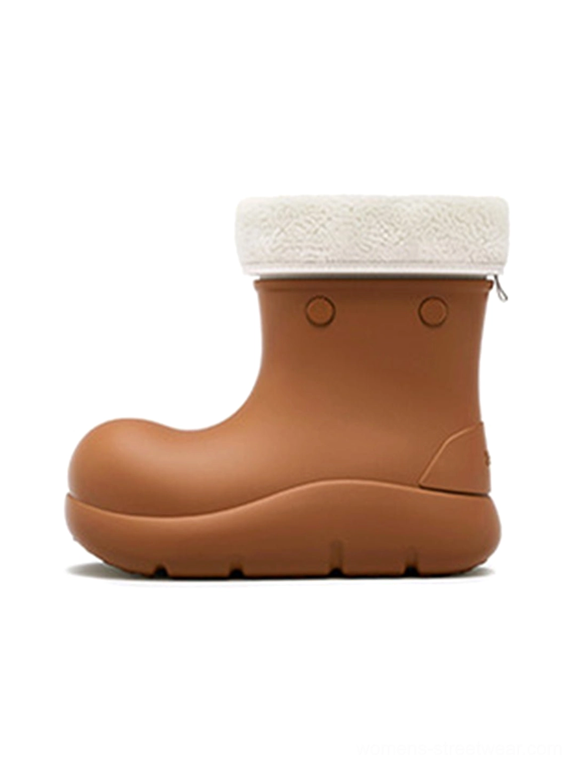 Brown fur-lined platform ankle boot in left side profile with matte tan upper, ivory fluffy cuff, decorative studs, and chunky winter sole