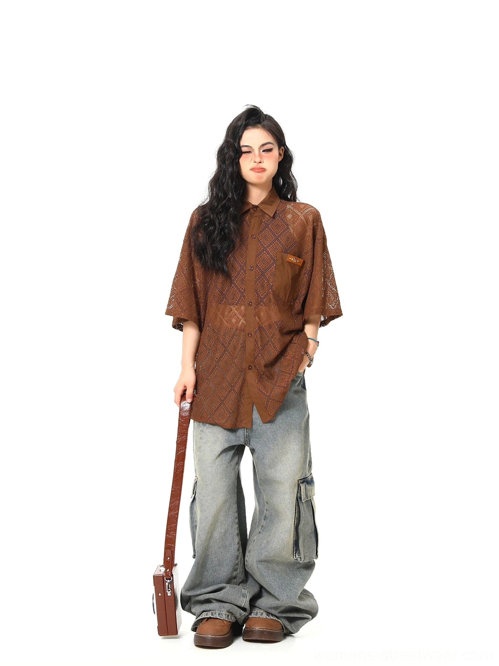 Brown geometric lace button-up shirt styled with wide-leg jeans and loafers in a full-body streetwear outfit
