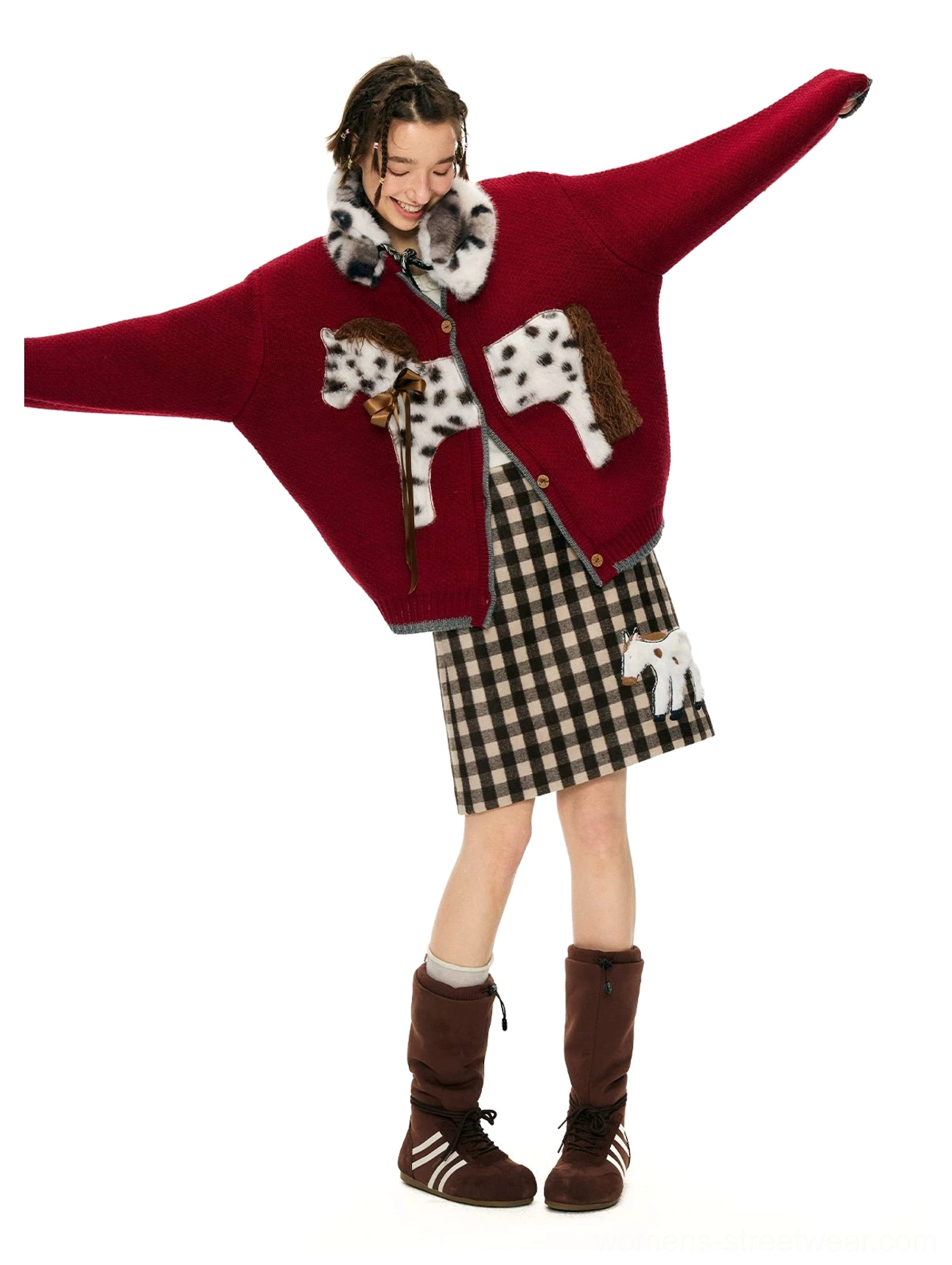 Back view of brown gingham pony appliqué mini skirt styled with a burgundy fuzzy coat for winter streetwear