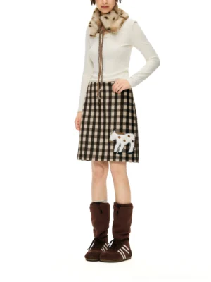 Brown gingham pony appliqué wool blend mini skirt styled with a casual matching outfit in a front full body studio view