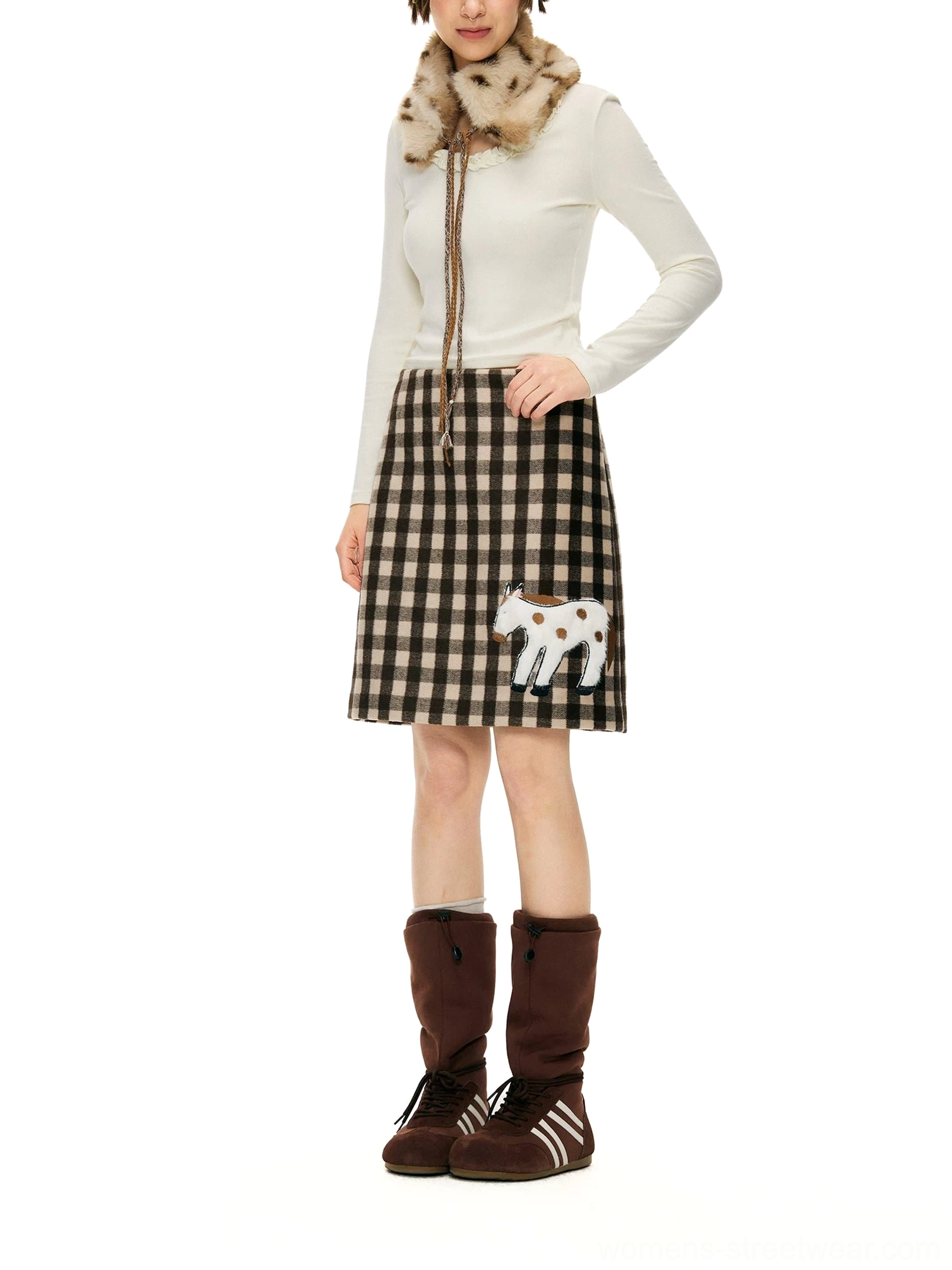 Brown gingham pony appliqué wool blend mini skirt styled with a casual matching outfit in a front full body studio view
