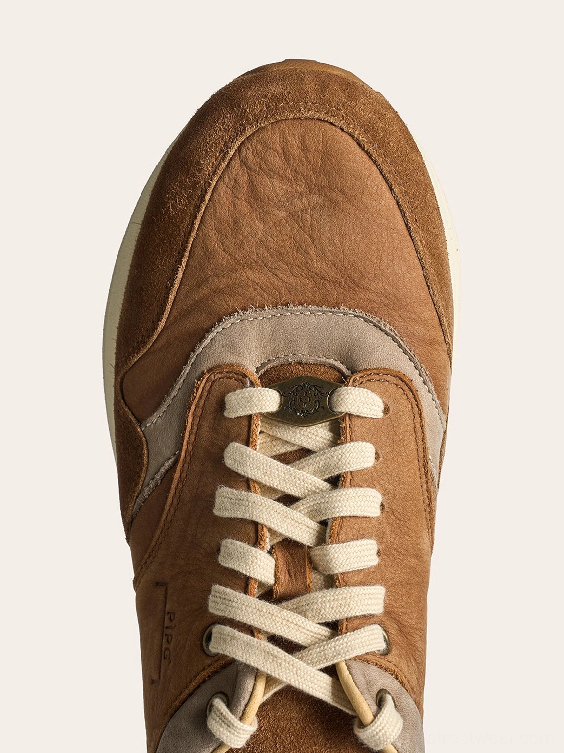 Brown gorpcore trail runner sneakers designed for casual city outfits and relaxed utility styling