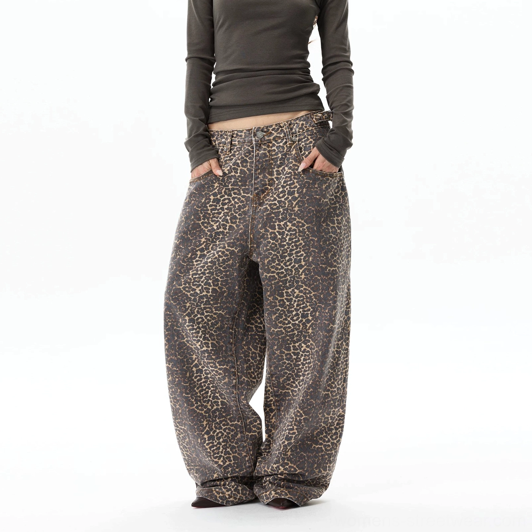 Angled rear front view of brown leopard print wide-leg baggy jeans styled for Korean street fashion and retro Y2K outfits