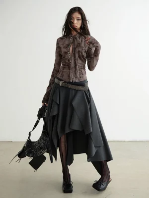 Brown marble print slim fit shirt styled with asymmetrical skirt and studded belt