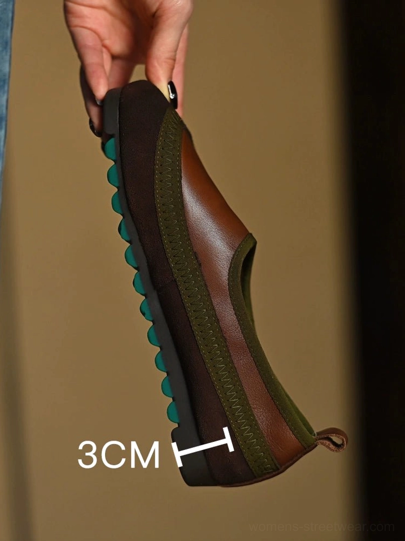Single brown and olive green leather slip-on shoe with rear pull tab, dark brown heel counter, and approximately 3cm lift