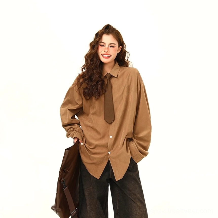 Brown oversized corduroy shirt with coordinated necktie for modern womens streetwear and menswear inspired styling