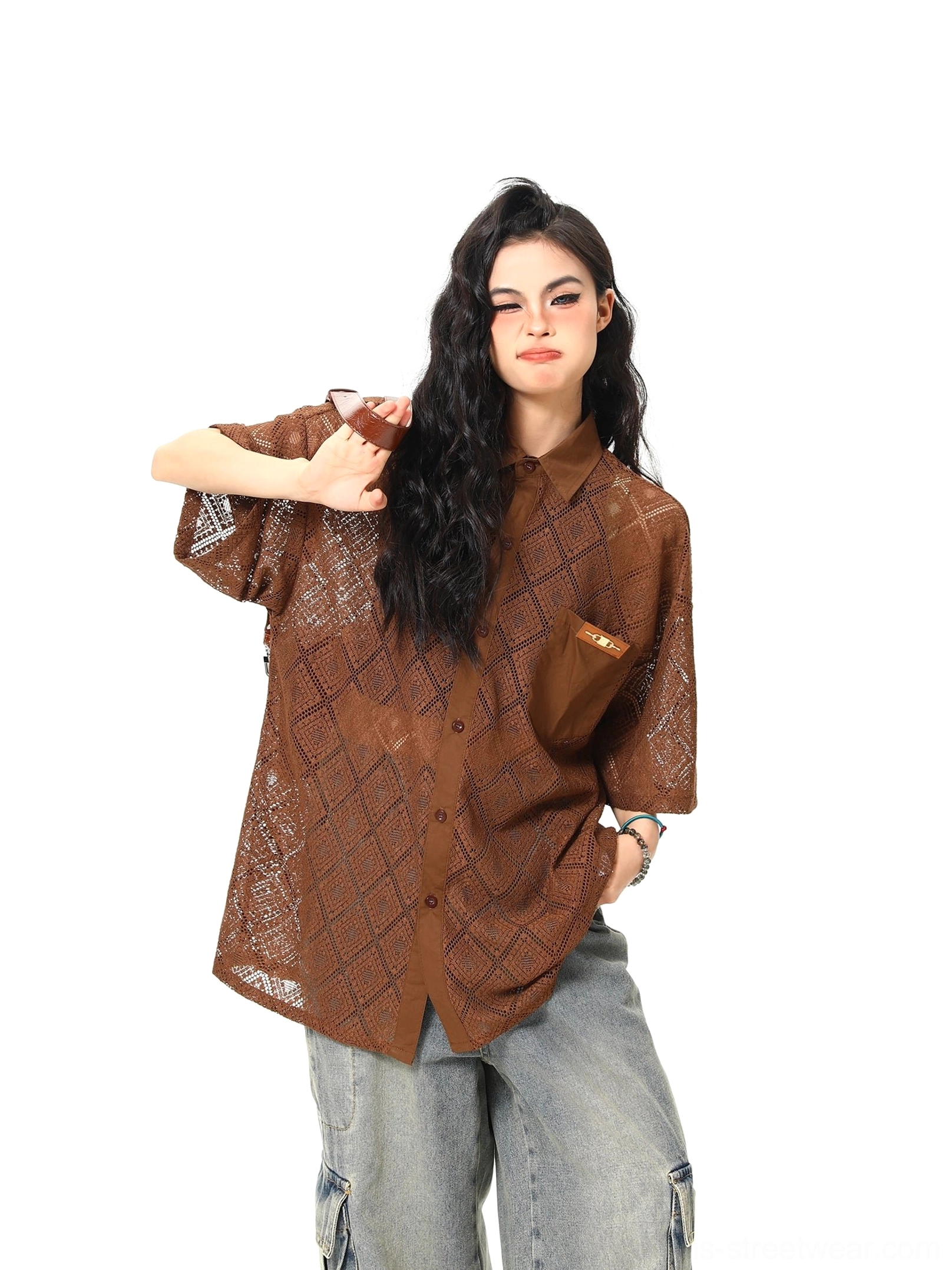 Brown oversized geometric lace short sleeve shirt styled with cargo wide-leg jeans in studio