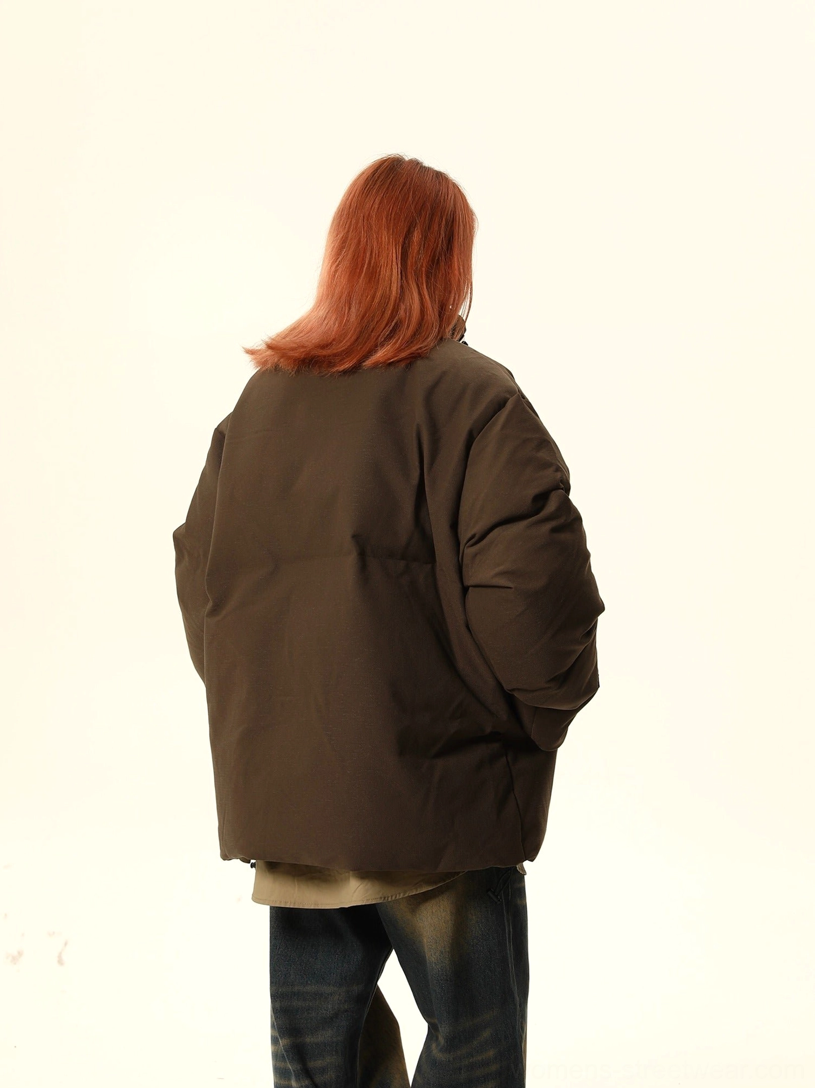 Brown oversized stand collar puffer jacket full back view showing clean matte streetwear silhouette