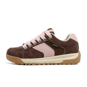 Brown and pink suede court sneakers with two-tone panels, pink accent detail, branded heel tab, and casual streetwear profile