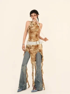 Front full-body view of brown post-apocalyptic asymmetric high-low dress with mock neck, faded graphic wash, distressed trailing hem, and flared denim styling