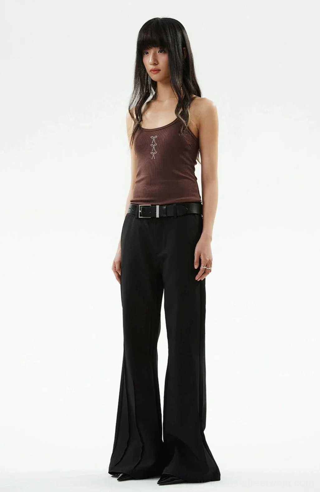 Full front view of brown rhinestone bow ribbed tank top with black wide-leg streetwear trousers