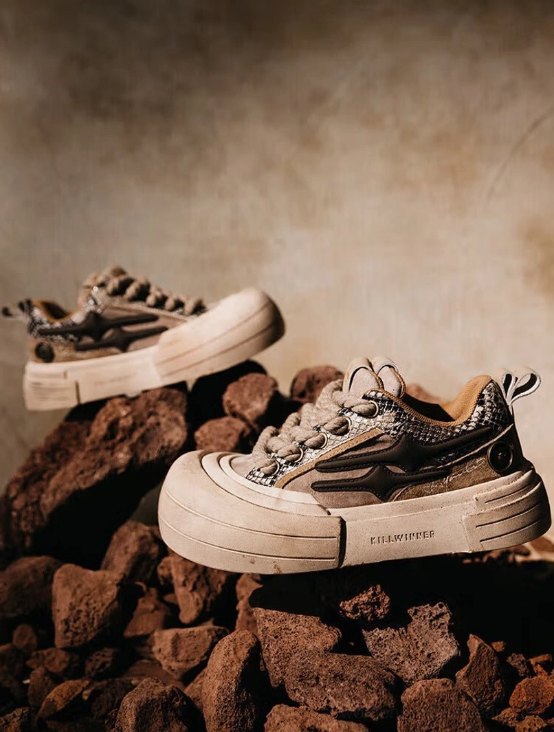 Brown smiley lightning platform sneakers showing chunky vintage sole profile and layered streetwear sneaker design