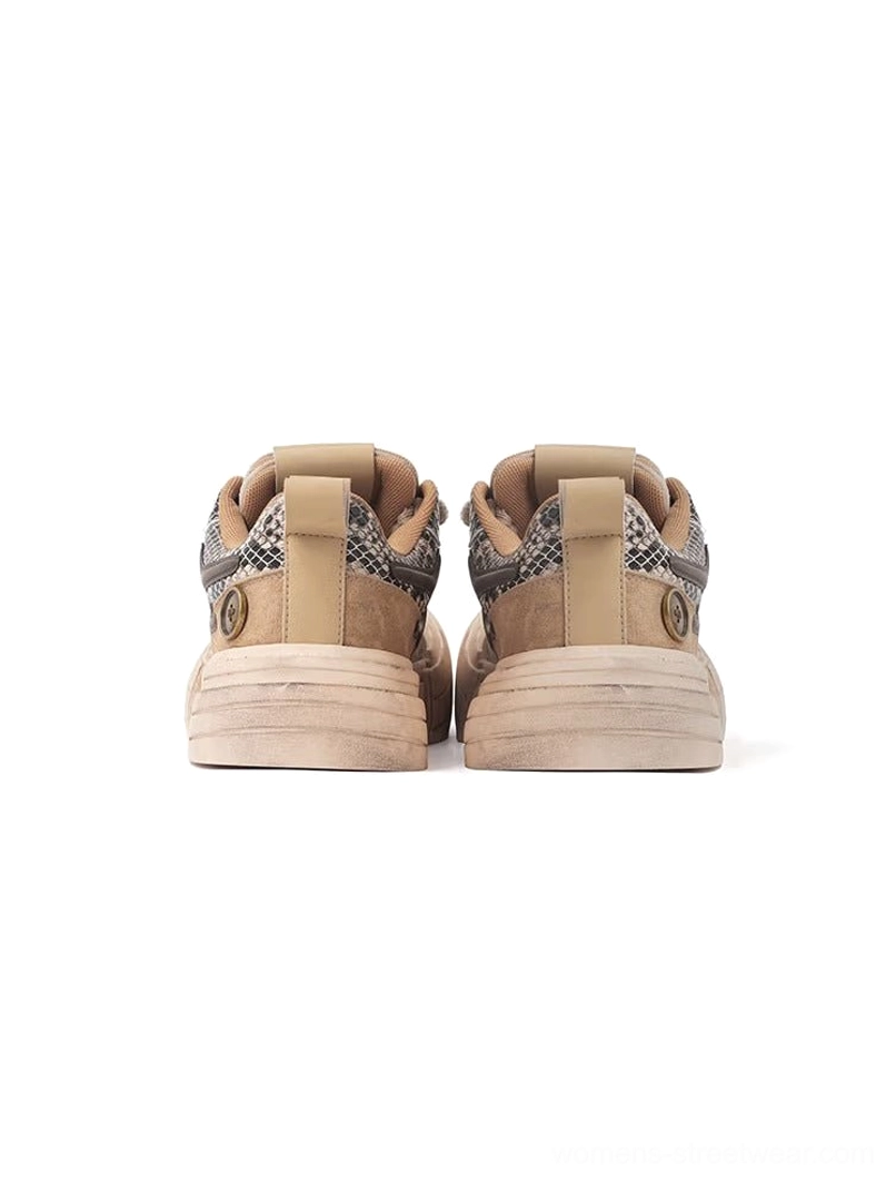 Brown smiley lightning platform sneakers detailed view of layered brown panels cream sole and casual skate inspired shape