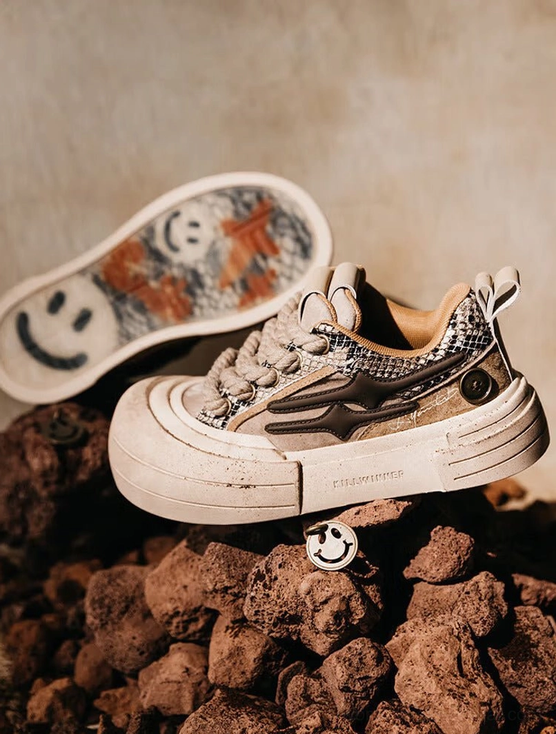Brown smiley lightning platform sneaker flat lay showing printed smiley insole layered upper and vintage chunky sole