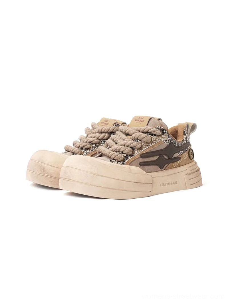 Brown smiley lightning platform sneakers in warm brown colorway with oversized cream outsole for everyday streetwear