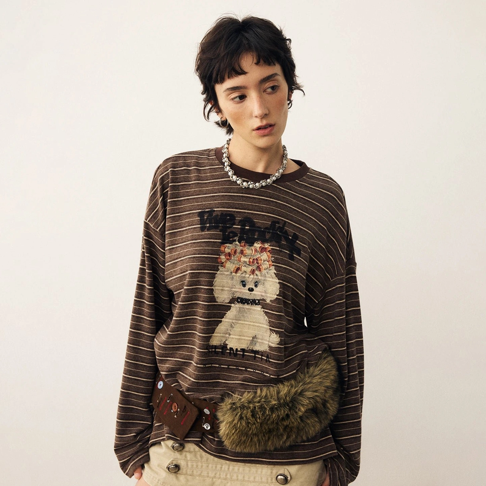Brown striped puppy graphic oversized long sleeve t-shirt showing relaxed Korean streetwear fit and front artwork