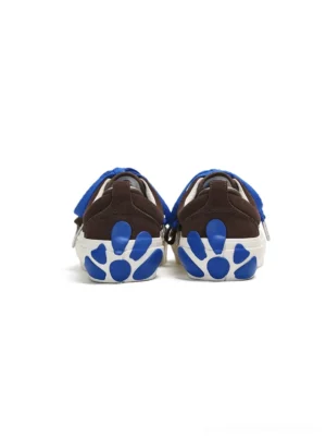 Rear view of brown suede flower platform sneakers showing blue daisy heel outsole accents, matching double laces, and convenient heel pull tabs