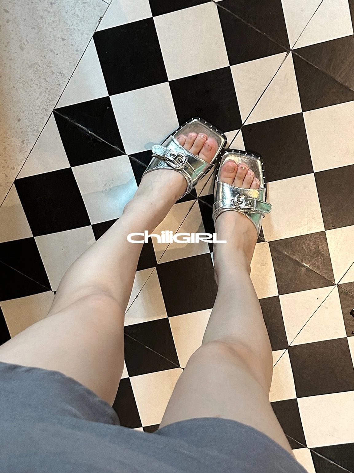 Buckled square-toe low-wedge slide sandals in black and silver contemporary streetwear footwear design