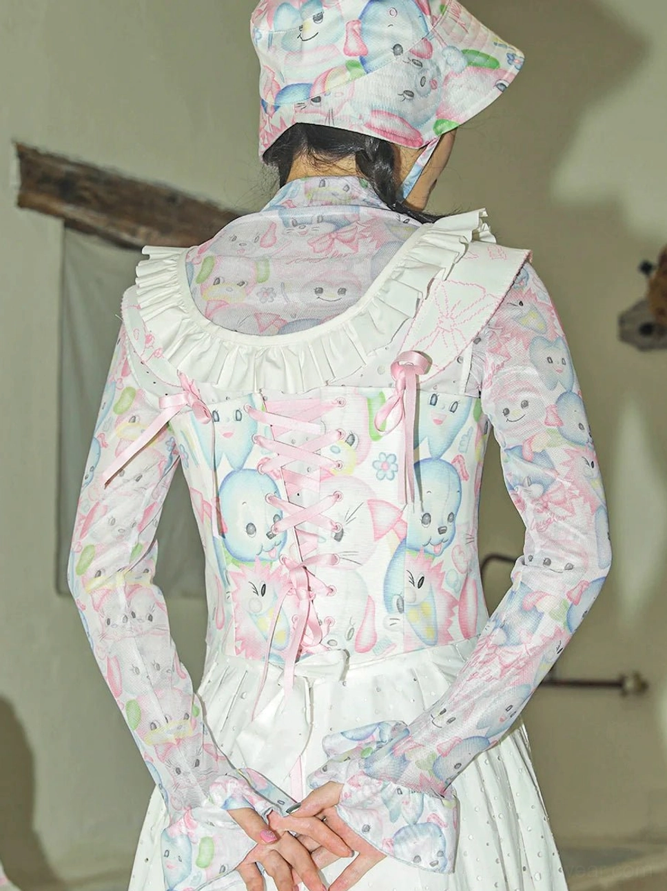 Back view of bunny print corset camisole showing lace-up fastening and coordinated Lolita-inspired streetwear styling