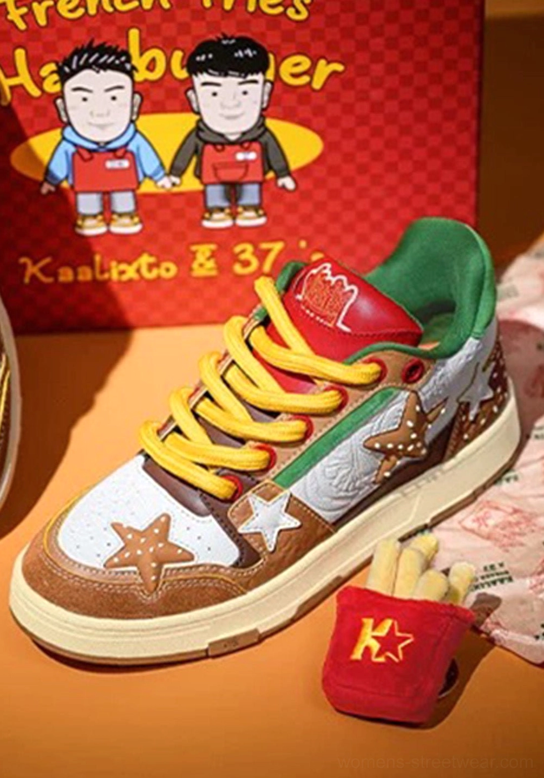 Burger Star low-top skate sneaker close-up with oversized star patch yellow laces and brown white green burger-inspired panels