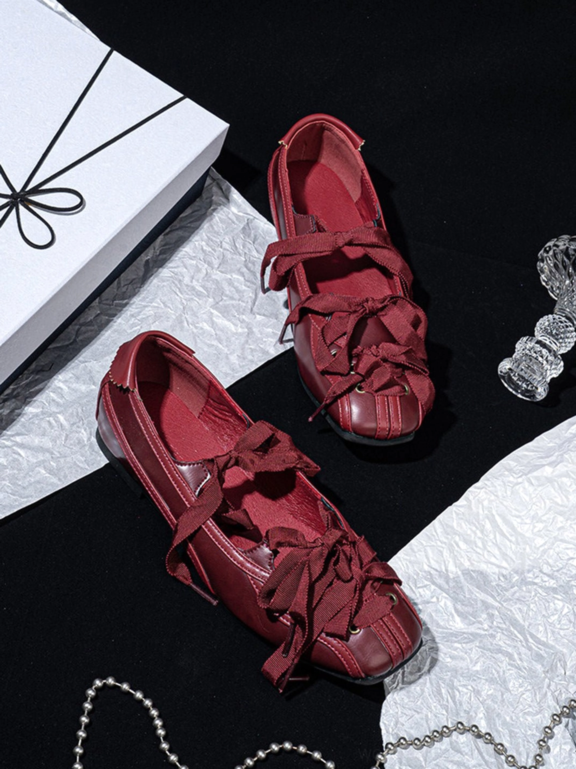 Burgundy bow ballet flats for women styled as a romantic alternative to everyday streetwear sneakers