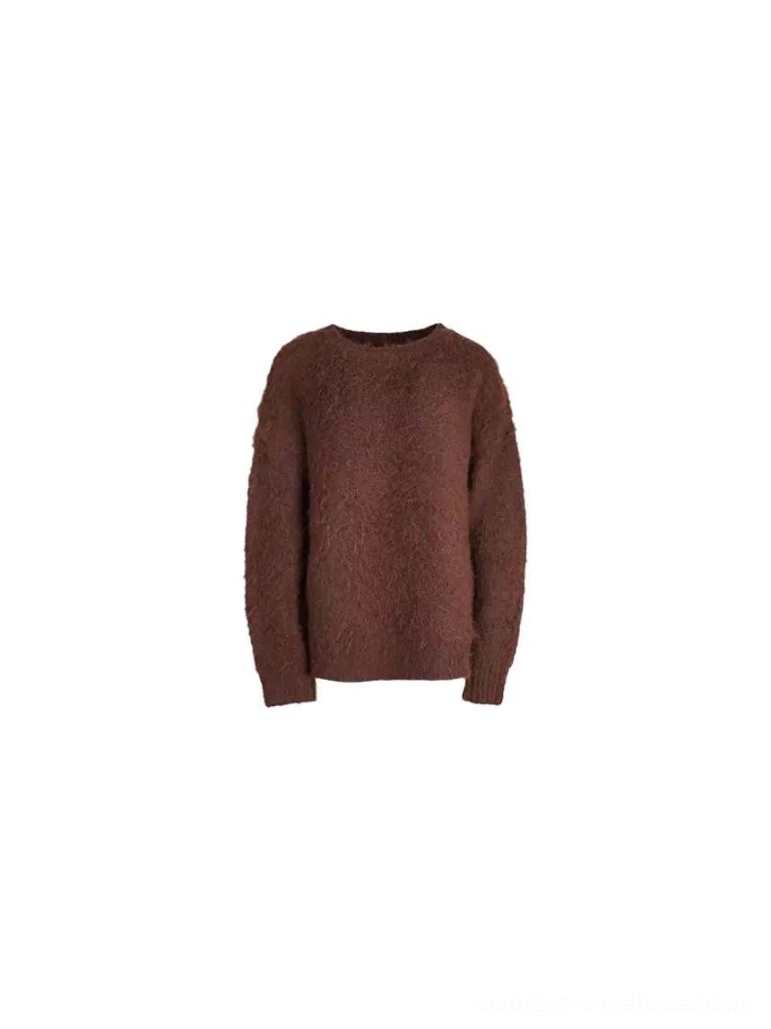 Warm burgundy-toned fuzzy knit sweater flat lay showing long sleeves, relaxed silhouette, soft textured knit surface, and open neckline