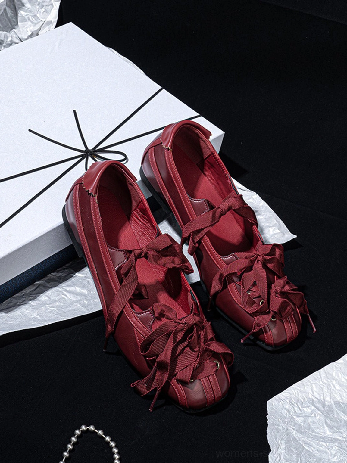 Burgundy square-toe ballet flats with ribbon laces and bow accents for women’s everyday outfits