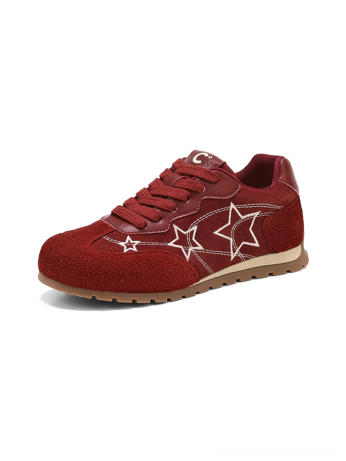 Front three-quarter product view of burgundy suede-look star embroidered retro low-top sneaker with brown gum sole