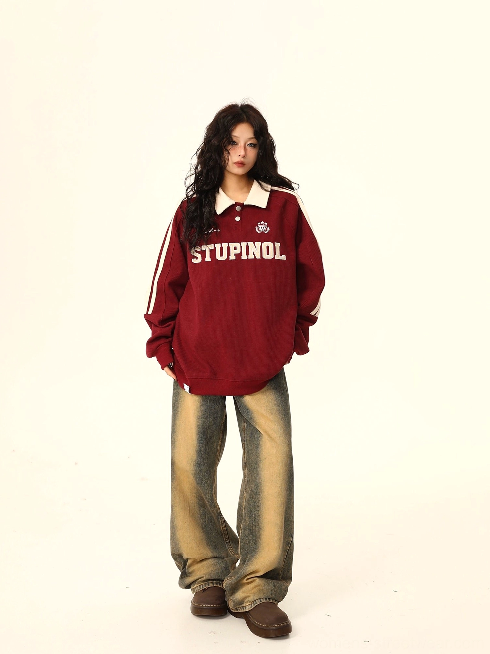 Back and side view of a burgundy varsity polo sweatshirt with white contrast details and relaxed oversized streetwear fit