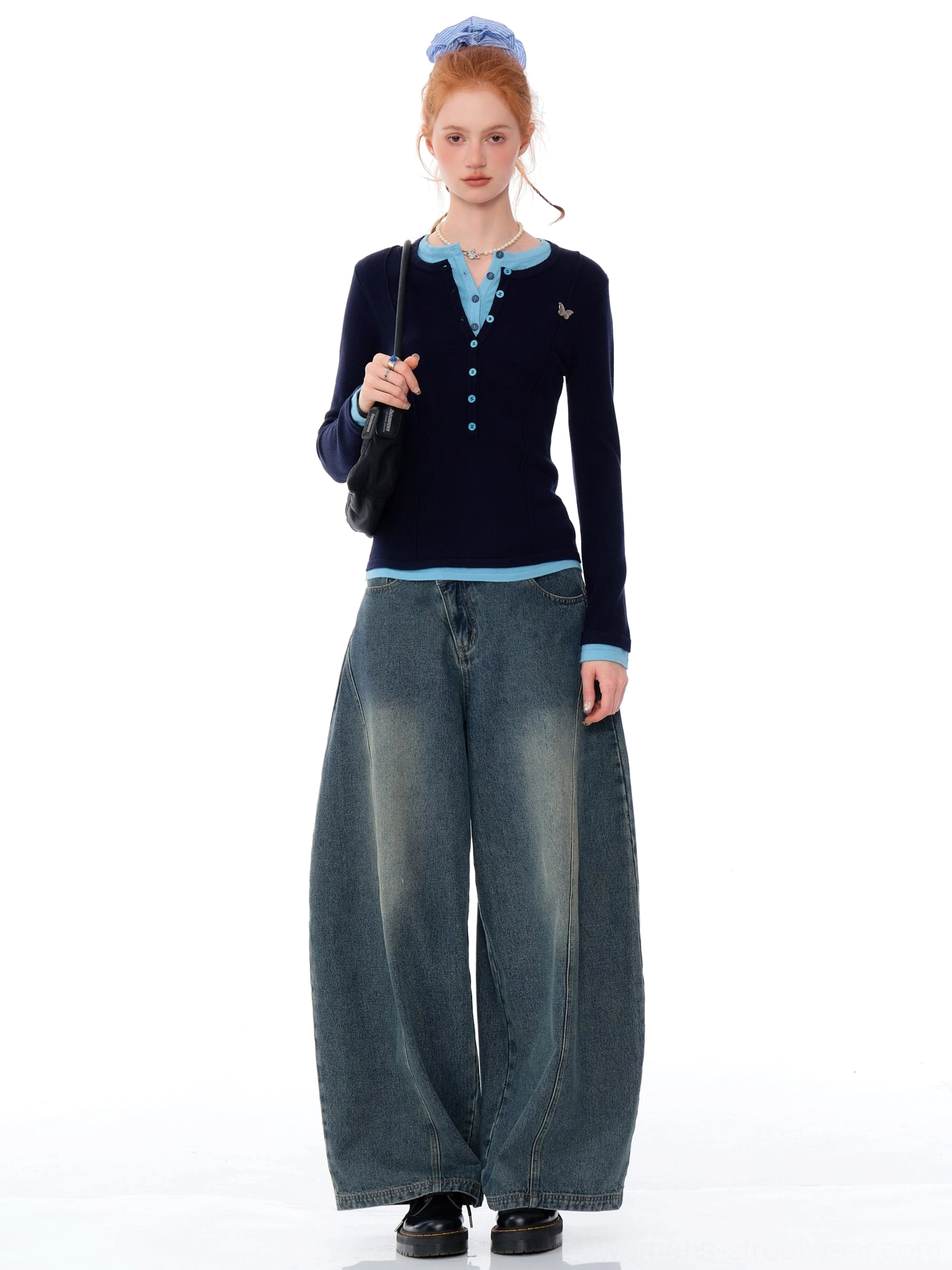 Full body Seoul streetwear outfit featuring navy blue butterfly contrast trim Henley knit top and wide leg jeans